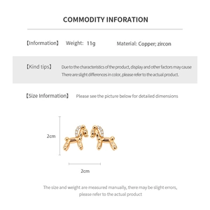 Detail view of 18k gold plated balloon horse earring with zircon insets and 2cm size scale