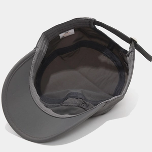 Detailed view of dark grey military cap interior showing sweatband and adjustable metal buckle