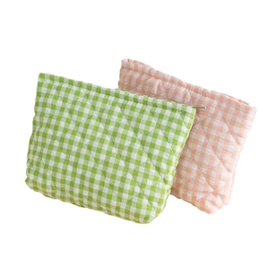 Quilted corduroy plaid makeup bags in green and orange with diamond stitching