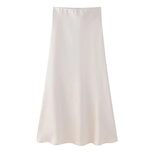 Detail of champagne satin midi skirt showing smooth silk texture and elegant A-line cut