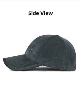 Close-up of dark grey winter baseball cap featuring textured corduroy and sport embroidery