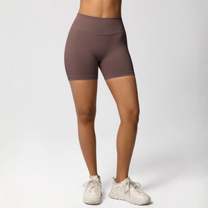 Detail of high waist seamless yoga shorts in coffee brown with wide waistband