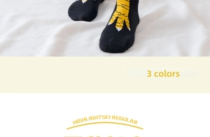 Detail showing creative chicken feet pattern on black long socks with high quality knit texture