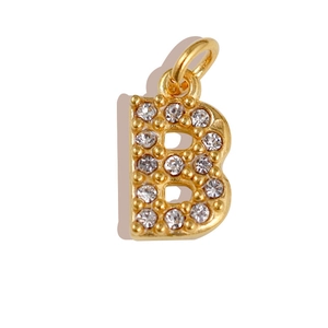 Detailed view of gold letter B pendant featuring sparkling pave-set cubic zirconia crystals