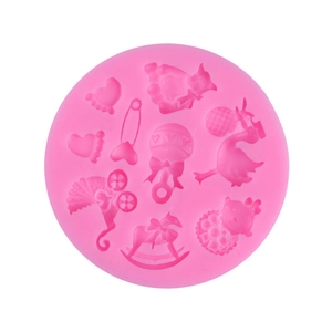 Pink silicone baby shower mold for fondant featuring baby carriage and rocking horse shapes