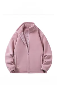 Detail of dusty pink fleece jacket showing zipper pockets and warm sherpa lining