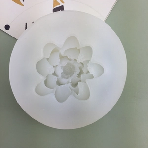 3D lotus silicone mold for making cakes, candles, or soaps on a light green background