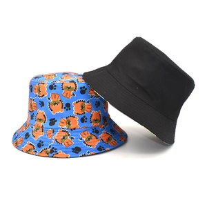 Double-sided cotton bucket hat with blue lion print and solid black inner lining