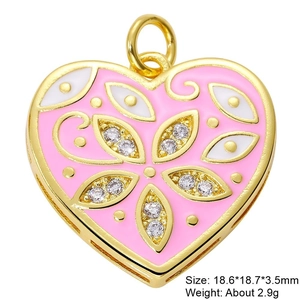 Pink heart-shaped pendant with gold frame and cubic zirconia stones in 18.6x18.7mm size