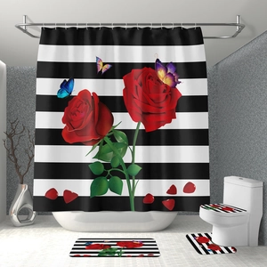 Detail of 4-piece bathroom set with red roses and butterfly on black and white stripes