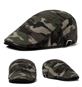Macro detail of breathable camo flat cap showing metal adjustable buckle and fabric texture