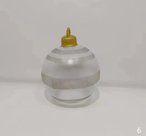 Detail of a 60cm silver inflatable Christmas ball with gray stripes and golden top hook