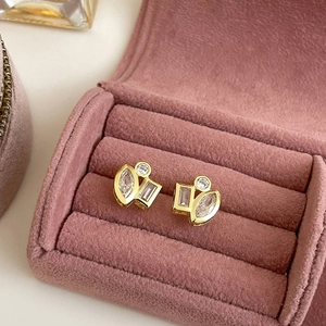 Elegant 18K gold plated geometric stud earrings with clear zircon in a pink velvet jewelry box