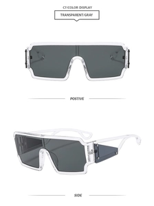 Detail view of transparent square punk sunglasses with grey lenses and geometric accents