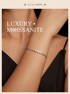 Close-up of luxury moissanite bracelet in S925 sterling silver on woman wrist
