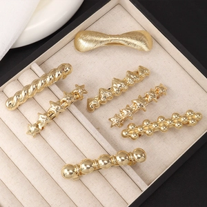 Set of 7 elegant gold-plated metal hair clips in various chic geometric designs