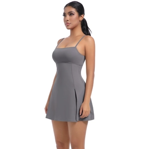 Detail of dark grey sports dress featuring side slit design and stretchable fabric