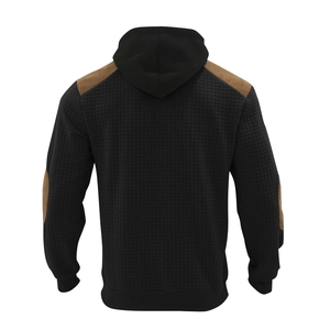 Detail view of black waffle texture hoodie with brown suede patches on elbows and shoulders
