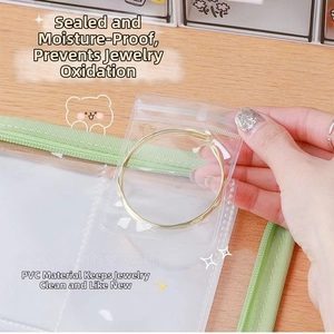 Transparent PVC storage bag protecting a gold bracelet from oxidation and moisture