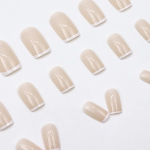 Elegant French square press-on nails with nude base and white tips, 24 pieces set
