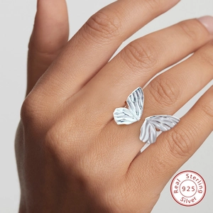 Detailed macro view of S925 sterling silver butterfly double-finger adjustable ring