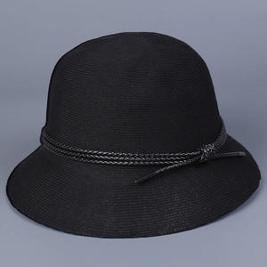 Detail of black fine-knit sun hat featuring woven texture and tied rope accent
