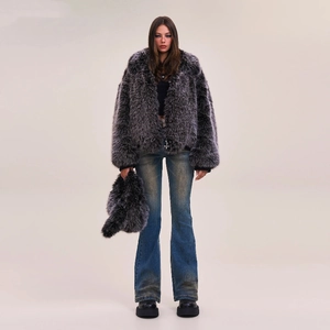 Faux fur jacket with flared jeans and platform boots for a stylish winter look