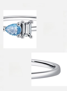 Detail of 925 sterling silver ring featuring pear-shaped blue and rectangular zircon