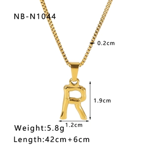 Detail view of 18k gold plated letter R pendant necklace with specific size measurements