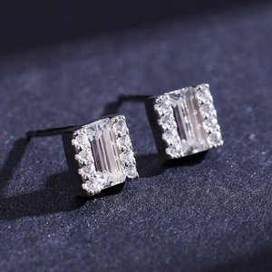 S925 sterling silver stud earrings with emerald-cut zirconia and side stones