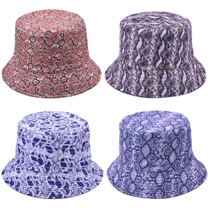 Reversible bucket hats featuring faux snakeskin animal prints in four varied color options