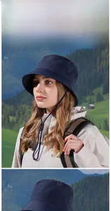 Detail of dark blue quick-dry sun hat with adjustable windproof drawstring and breathable mesh