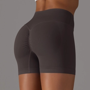 Dettaglio dei pantaloncini yoga senza cuciture a vita alta con effetto push-up grigio