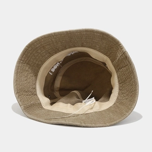 Retro washed cotton bucket hat in khaki featuring white interior letter embroidery detail
