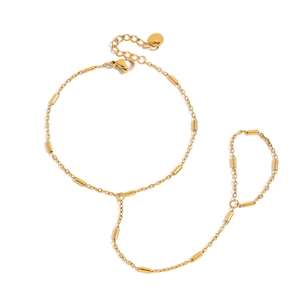 Élégant bracelet de doigt en acier inoxydable doré avec maillons bambou et style épuré