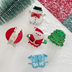 5-piece glitter Christmas hair claw clip set with Santa and snowman on festive backdrop