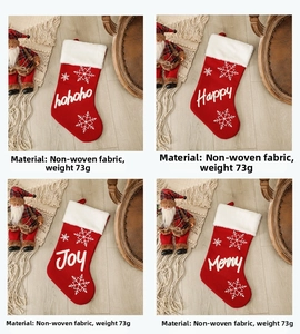Set of four plush Christmas stockings with snowflake embroidery, weight 73g each