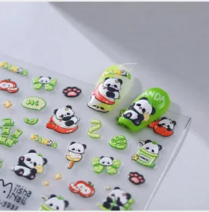Detailed macro view of 3D embossed panda nail art stickers with bamboo and paw prints
