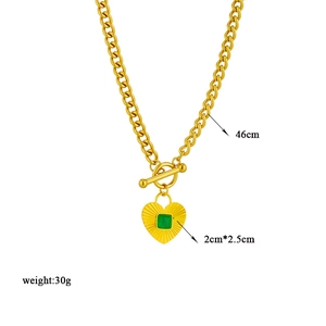 French vintage gold necklace with emerald zircon heart pendant and size annotations