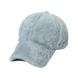 Close-up of grey plush baseball cap showing thick faux fur texture and curved brim