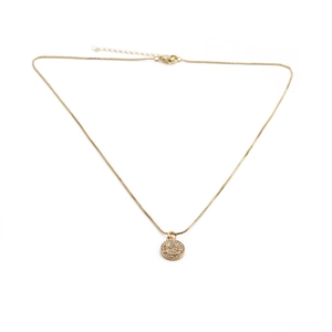 Gold smiling face necklace with micro-paved cubic zirconia pendant on white background