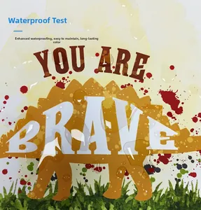 Waterproof detail of a wooden dinosaur wall hanging with You Are Brave slogan