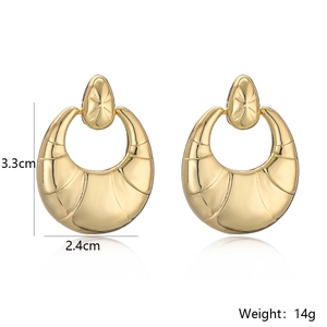 Detail view of geometric crescent earrings with dimensions 3.3cm by 2.4cm and 14g weight
