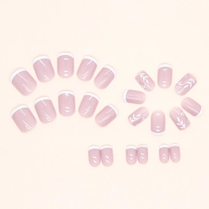 Short square French press-on nails with white tips, pink base and subtle glitter accents