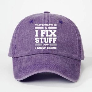 Close-up of purple washed cotton baseball cap with I FIX STUFF slogan and wrench icon