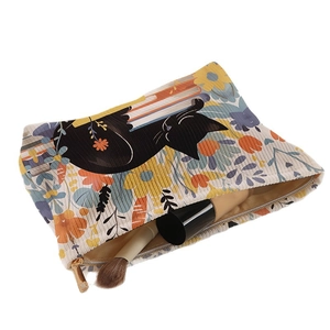 Floral cat and book print corduroy cosmetic bag with zipper and inner lining