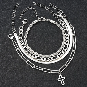 Silver multi-layer bracelet set featuring twisted, snake, and cross pendant paperclip chains