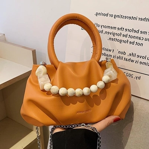 Designer orange pleated cloud bag for women with marble bead handle and metal chain