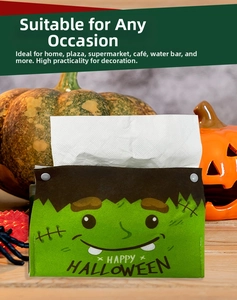 Halloween Frankenstein tissue box cover in green felt with festive pumpkin decorations
