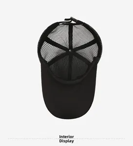 Interior view of black mesh baseball cap showing breathable lining and adjustable strap